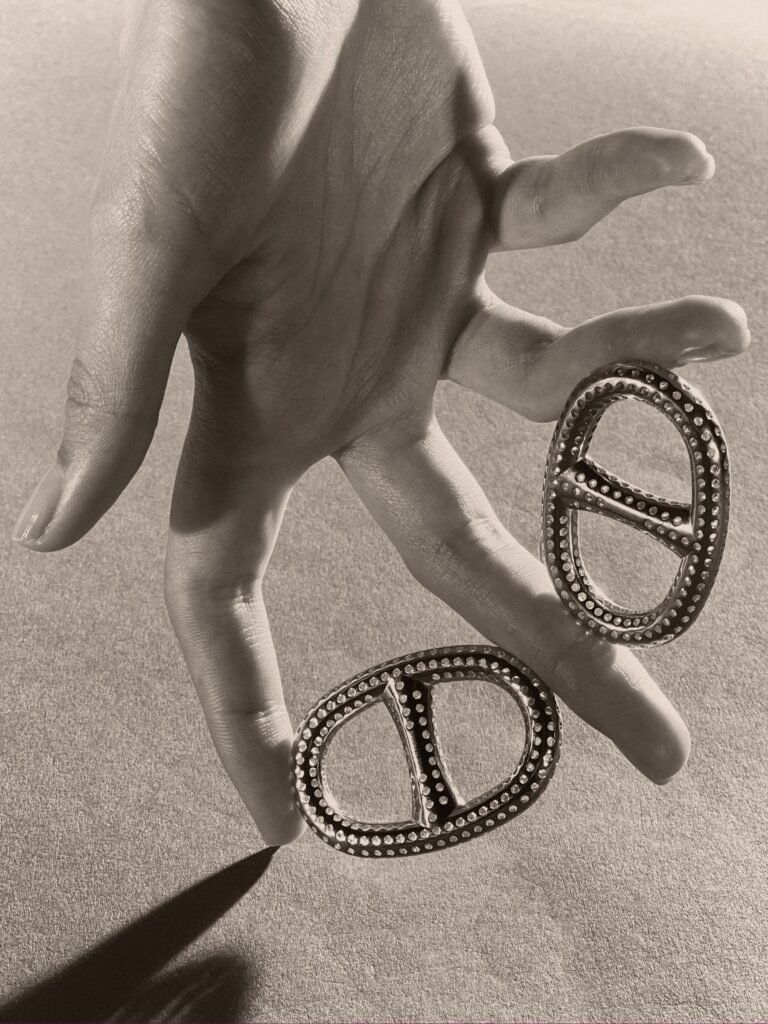 Surreal still life set design using Hermès fashion objects, combining playful and unexpected forms, created by Paris-based set designer Nara Lee, founder of Nara Lee Studio and nara.world, represented by Lambert Lambert agency, photographed by Paul Kooiker