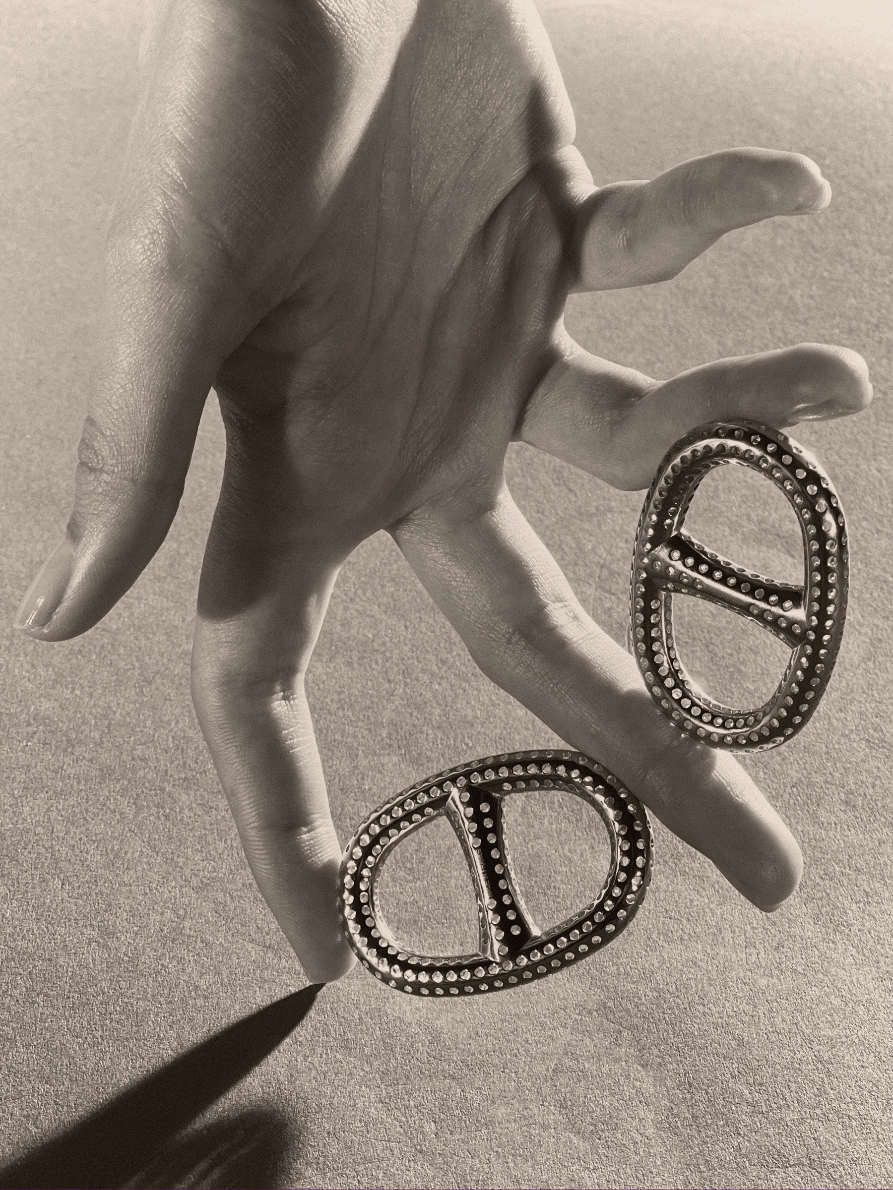 Surreal still life set design using Hermès fashion objects, combining playful and unexpected forms, created by Paris-based set designer Nara Lee, founder of Nara Lee Studio and nara.world, represented by Lambert Lambert agency, photographed by Paul Kooiker