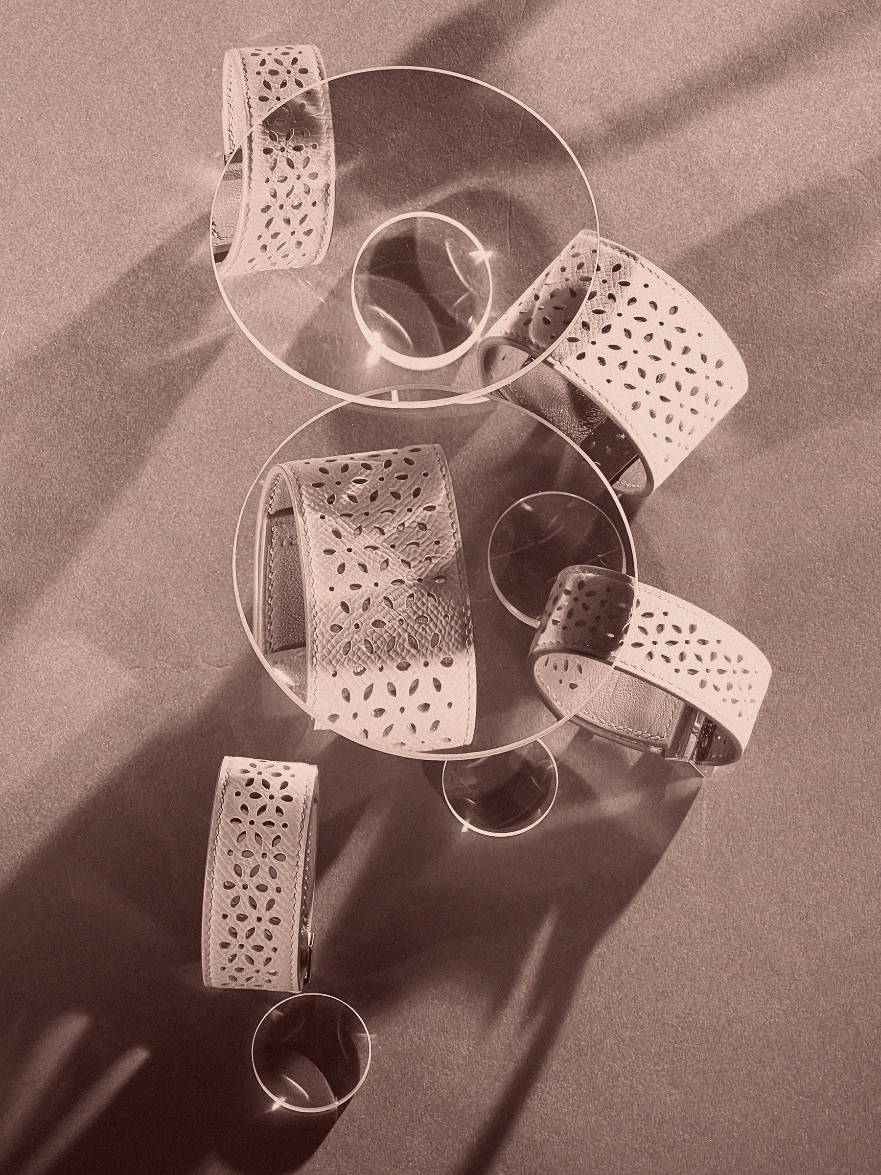 Conceptual still life set design and prop styling for Hermès Le Monde, featuring surreal compositions with signature Hermès products, created by Paris-based set designer Nara Lee (Nara Lee Studio), represented by Lambert Lambert agency, in collaboration with photographer Paul Kooiker